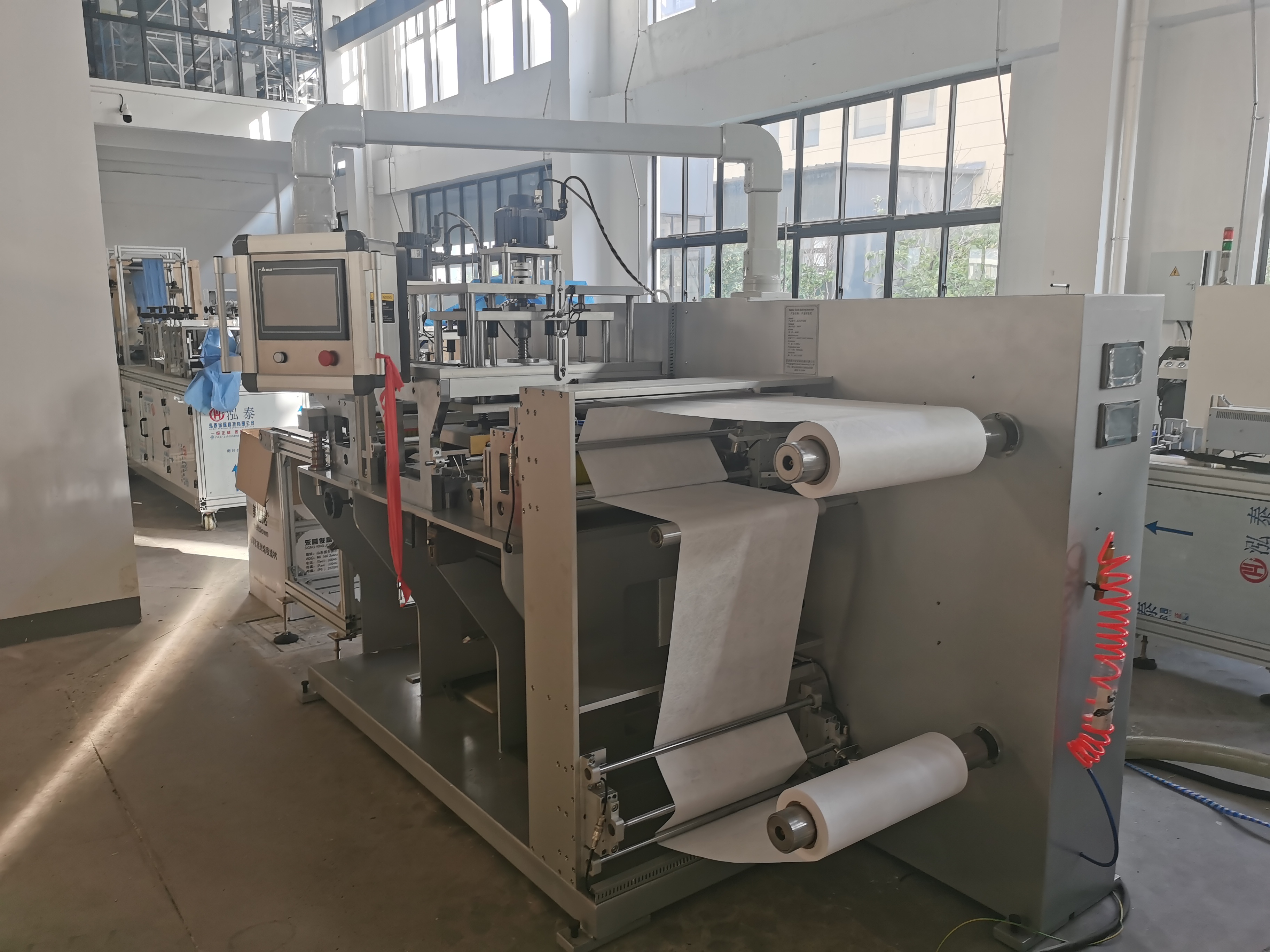 disposable glove machine for surgical gown